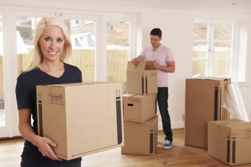 Removal team planning a house move in a German residential street