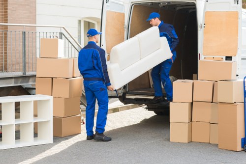 Professional loading of furniture into a moving van