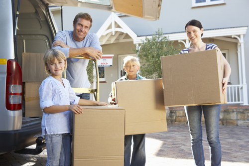 Professional movers carrying furniture in Germany