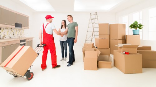 Local moving team loading furniture into a truck in a German city