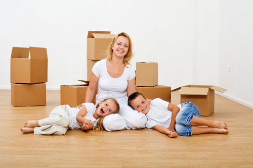 Packed moving boxes and furniture prepared for international transport