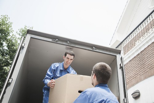Moving day preparation with labelled boxes and protective packing materials