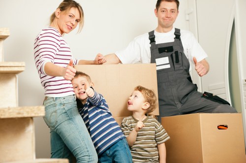 Loading boxes and furniture into a hire truck for moving day